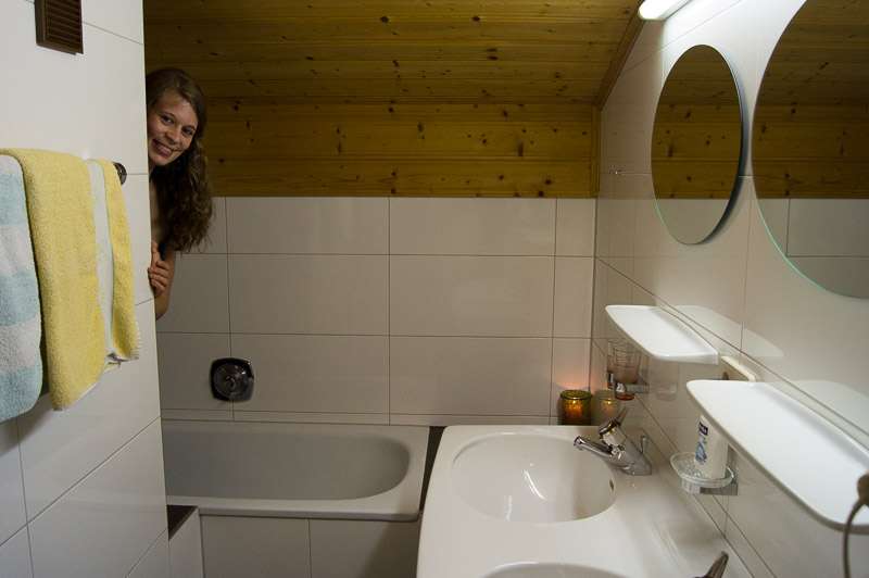 Bathroom with bathtub and washbasin