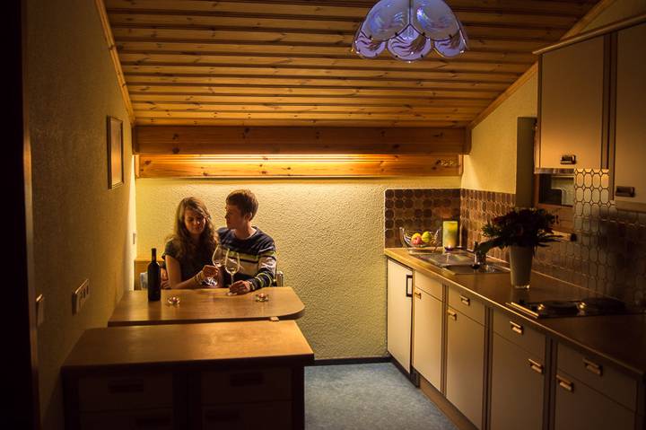 Kitchen and dining area with timber ceiling
